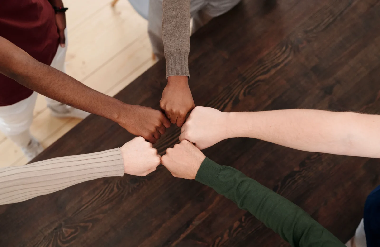 Hands together representing teamwork